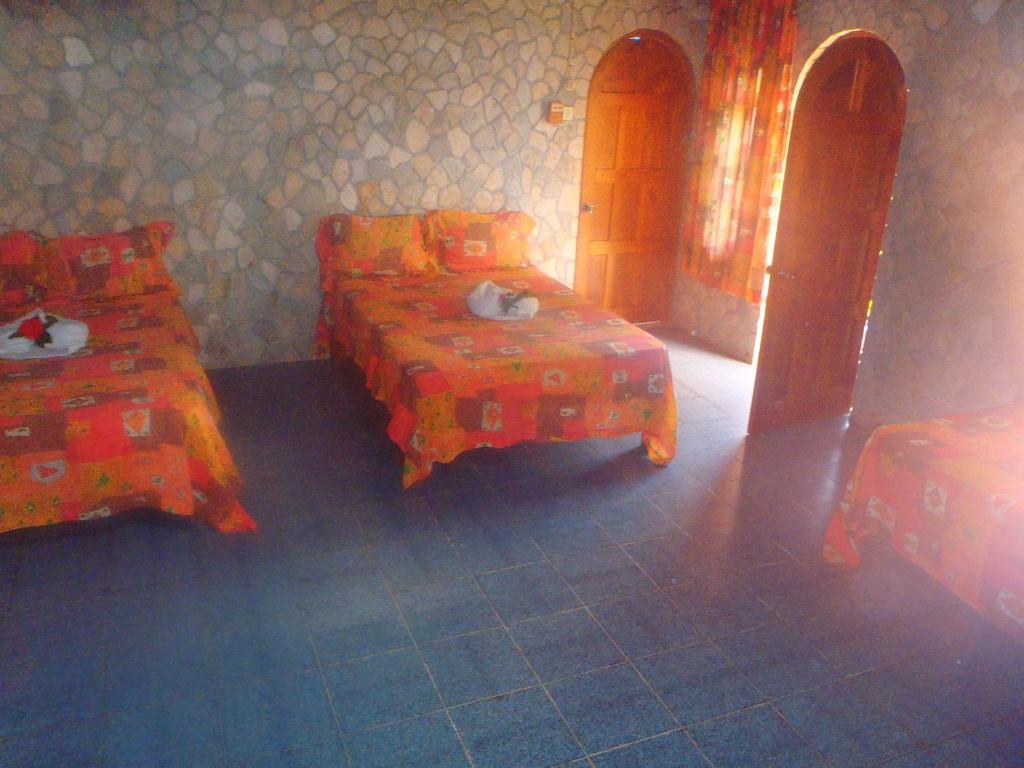 Cotton Tree Hotel Негрил Номер фото